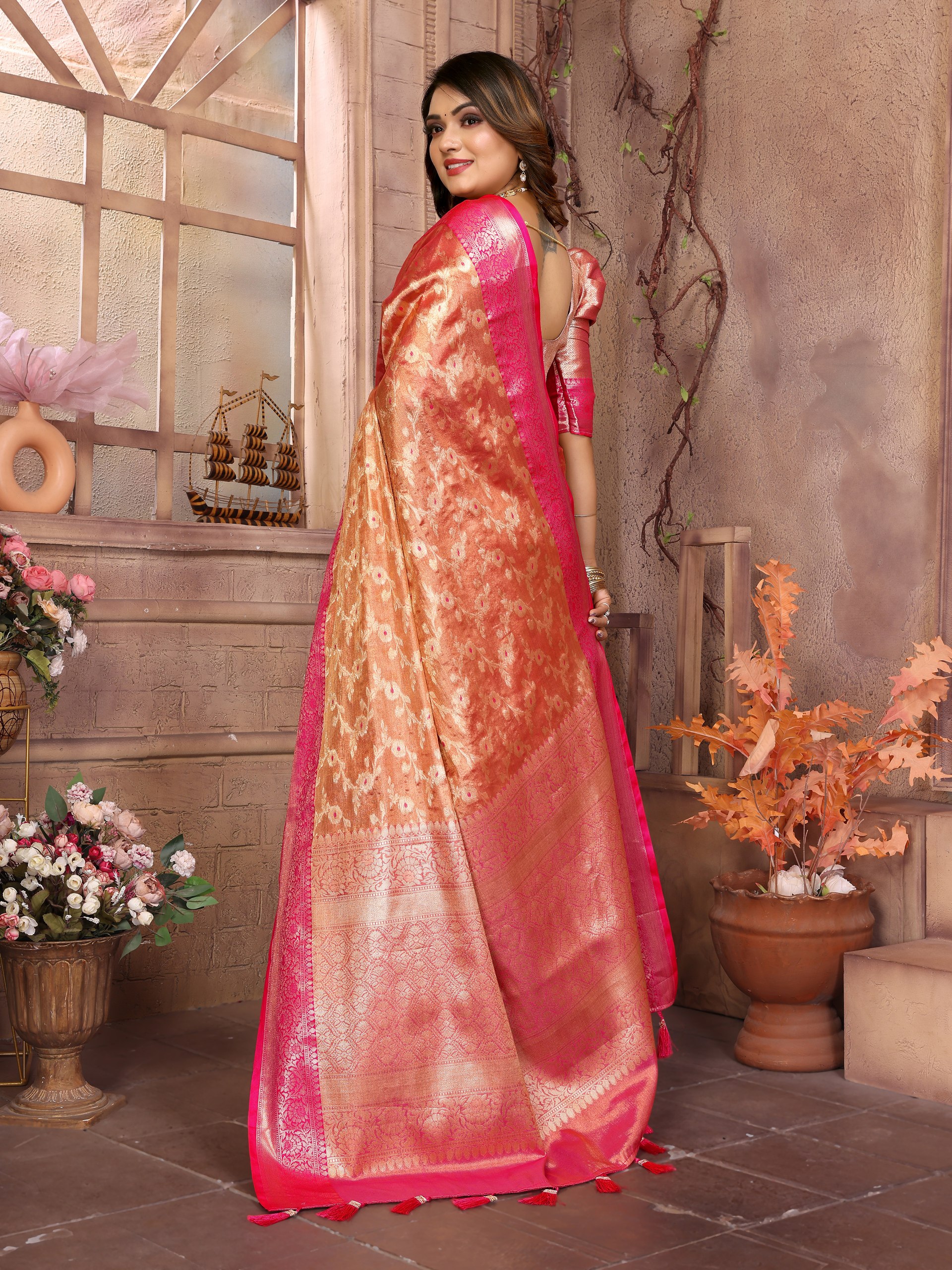 Handloom Tissue Silk Saree featuring intricate all-over Zari weaving designs