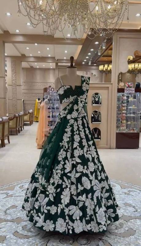 Faux Georgette Lehenga features intricate sequens embroidery