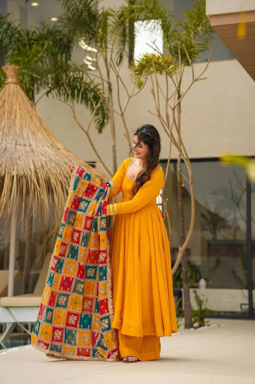  elegant three-piece ensemble featuring a Chinon silk top and palazzo pant with dupatta