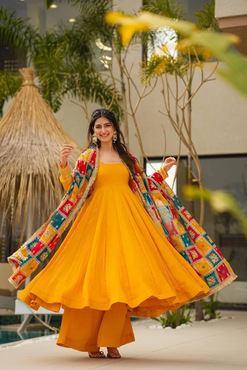  elegant three-piece ensemble featuring a Chinon silk top and palazzo pant with dupatta