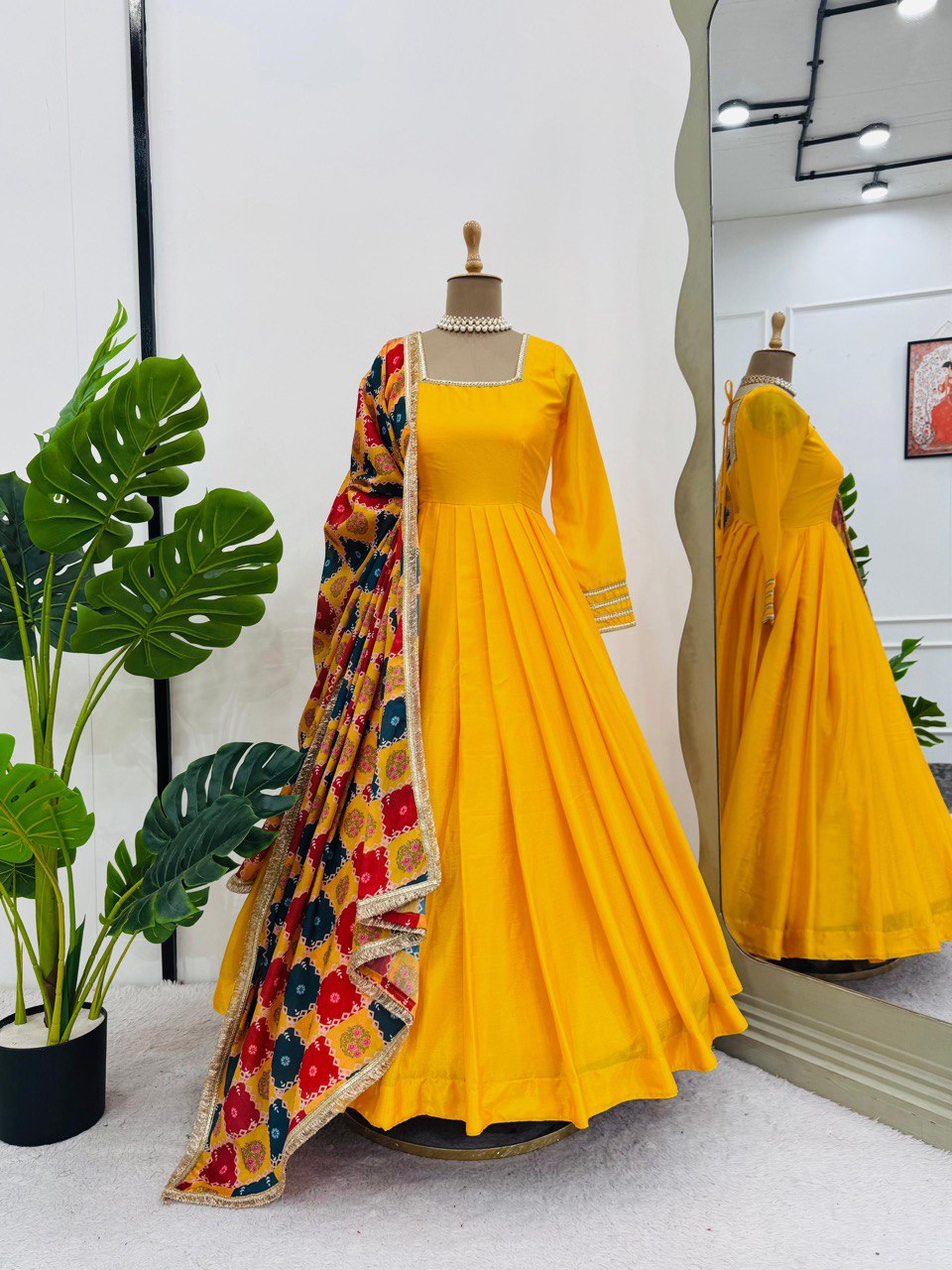  elegant three-piece ensemble featuring a Chinon silk top and palazzo pant with dupatta